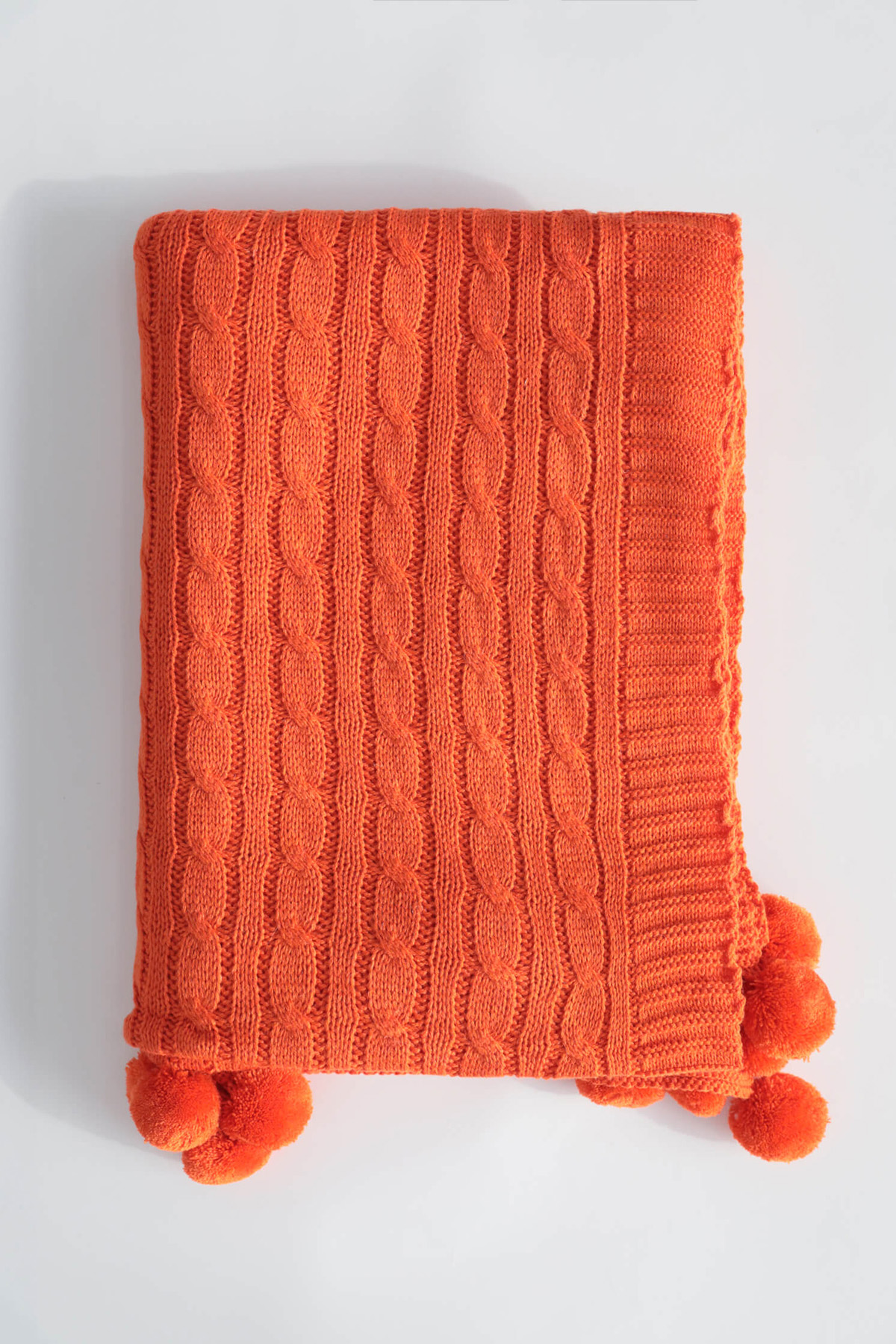 Biocotton Triko Ponponlu Tv Battaniyesi - Turuncu Biocotton Triko Ponponlu Tv Battaniyesi - Turuncu